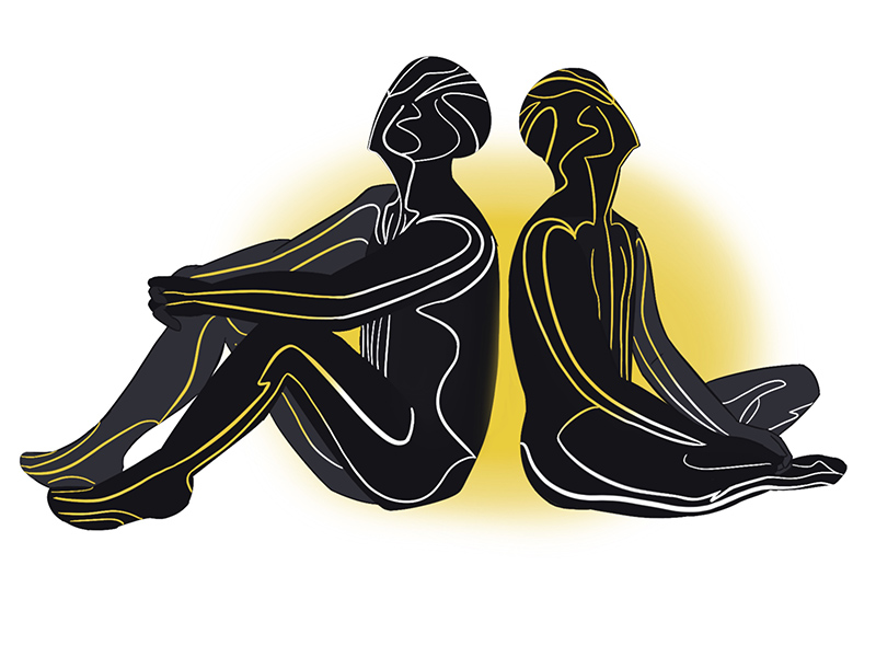 A drawing of two figures sitting back to back