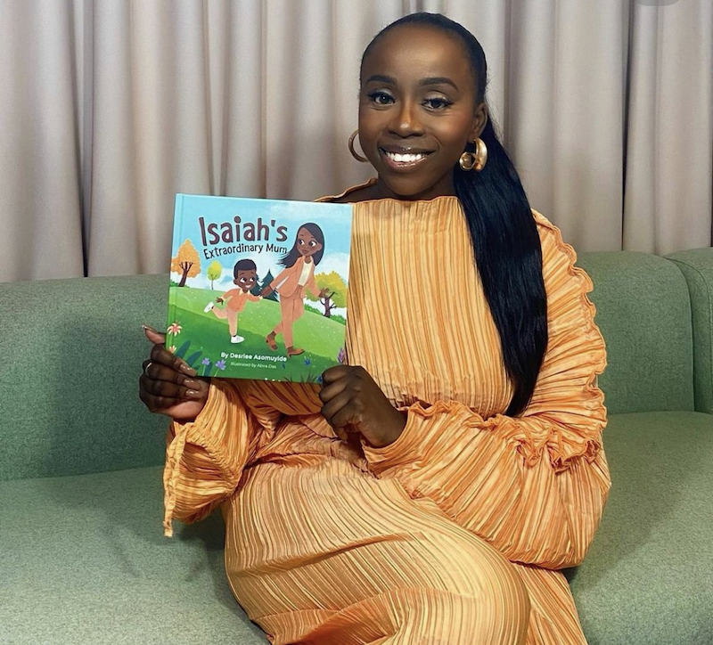 Little Omo founder Desriee Asomuyide with her children's book Little Omo founder Desriee Asomuyide with her children's book