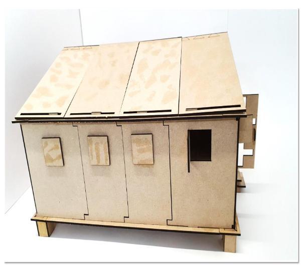 A side view of a scale model of a refugee shelter designed by UCA student Muhannad Darwish A side view of a scale model of a refugee shelter designed by UCA student Muhannad Darwish