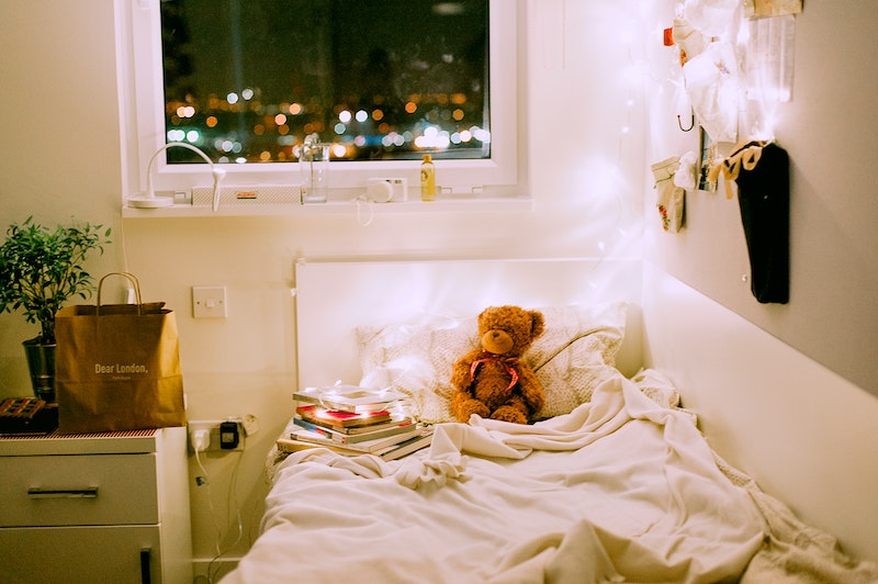 Picture shows a cosy single bedroom lit with fairy lights. Image by Daria Shevtsova via Unsplash Picture shows a cosy single bedroom lit with fairy lights. Image by Daria Shevtsova via Unsplash