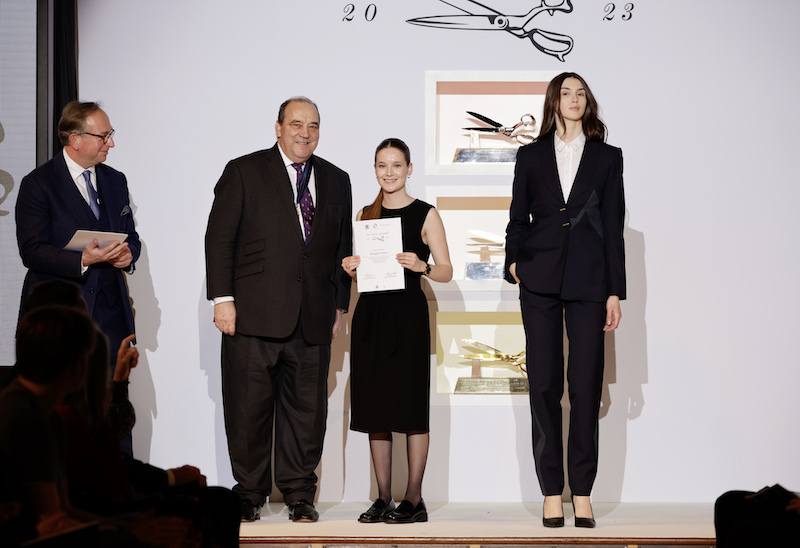 Imogen Lemm recieving her cerificate for reaching a standard of excellence in the competition Imogen Lemm recieving her cerificate for reaching a standard of excellence in the competition